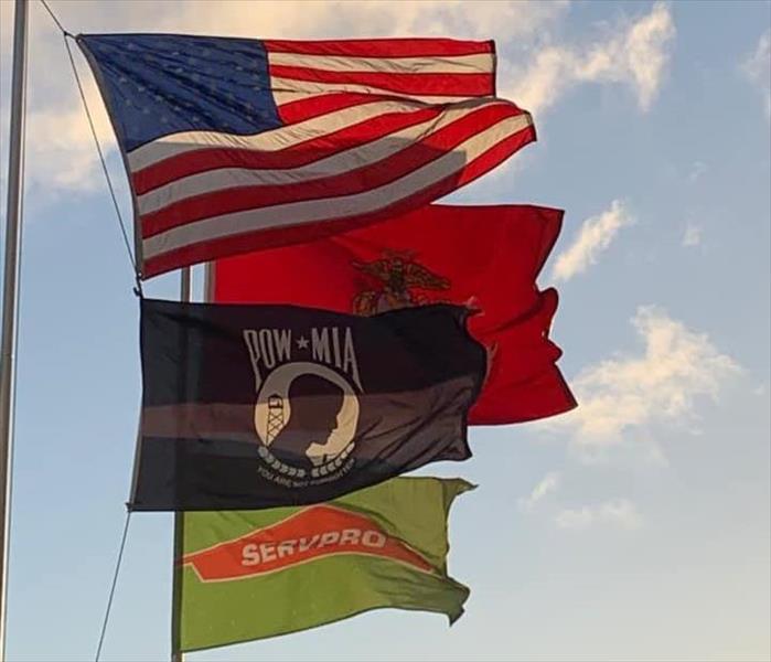 SERVPRO flag, USMC flag, POWMIA flag, American flag
